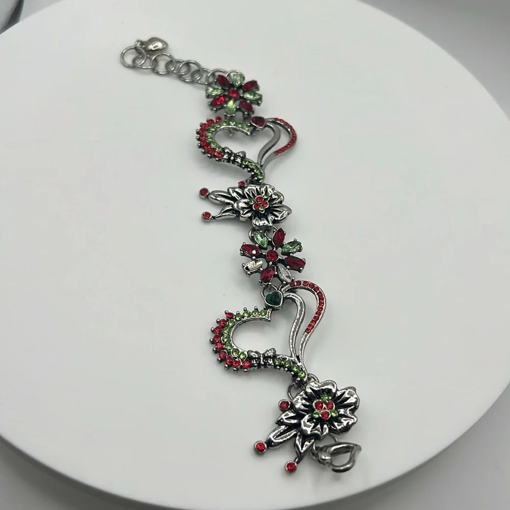 316. Elegant Silver and Red Floral Bracelet